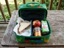 FOUND: Kid's lunch box near Grelmire Elementary. Contents... mostly normal.
