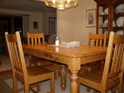 Dining table seats 6, seats 8 if you don't mind the whispers